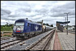 Pause für einen Tankzug im kroatischen Bahnhof Gospic. Am 15.05.2017 steht als Zuglok ein blauer Hercules von RailSea mit der Nummer 223003 davor.