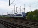 223 144 mit dem Container von Hof nach Glauchau bei der Ausfahrt in Reichenbach/V. oberer Bahnhof am 21.09.11.