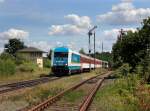 Die 223 064 mit einem Leerreisezug nach Amberg am 12.08.2012 bei der Durchfahrt in Hiltersdorf.