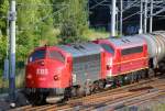 12.7.13 / EBS 1131 und Altmarkrail 1149 kommen mit einem Kesselzug aus Richtung Profen / hier kurz vor der Einfahrt in LLP