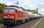 DB Cargo mit der 233 314-4 (92 80 1 233 314-4 D-DB) und gemischtem Kesselwagenzug am 14.09.18 Bf. Berlin-Hohenschönhausen.