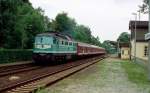 234 304-4 mit einer Regionalbahn aus Zittau bei Grossharthau am 25. Juni 1999.