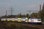 IGT 246 011 am 25.10.11 mit einem Metronom  nach Cuxhaven bei der Durchfahrt durch Hamburg-Unterelbe.
