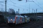 HVLE 246 010 am 17.1.14 mit einem Metronom bei der Einfahrt in Hamburg-Harburg.