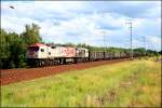 OHE 330090 ist ein seltener Gast in Berlin, hier mit leeren polnischen Eaos-Wagen (Berlin Wuhlheide, 20.06.2009).