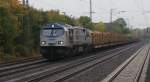 Ein  Blue Tiger 330091 der LTH fuhr am 10.10.2009 mit einem Holzzug durch den Wunstorfer Bahnhof.