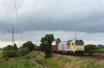 Eine Voit Maxima fuhr am 17.07.2012 mit einem Kieszug von Emden gen Sden, hier sdlich von Leer.