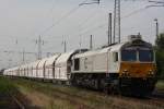 Euro Cargo Rail 247 026 fhrt am 7.6.11 mit einem Kalkzug in Ratingen-Lintorf.