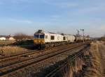 Die 247 053 mit einem Kesselzug am 08.03.2013 bei der Ausfahrt aus Tling.