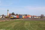 247 058 mit einem Containerzug am 20.03.2014 bei Heiligenstatt.