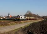 Die 247 048 mit einem Müllzug am 24.12.2014 unterwegs bei Altötting.