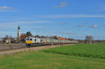 247 038 mit einem Müllzug am 18.11.2015 bei Heiligenstatt. 