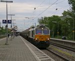 247 031-8 mit Kesselwagenzug bei der Durchfahrt durch München-Riem. Aufgenommen am 04.05.2015.