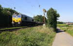 Die Class 66 266 035-5 von Railtraxx kommt mit viel Dieselpower die Gemmenicher-Rampe hochgefahren aus Richtung Aachen-West mit einem Schienenzug aus Österreich nach  Schaarbeek(B) und fährt