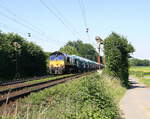 Die Class 66 266 112-2 Beacon-Rail  kommt mit viel Dieselpower die Gemmenicher-Rampe hochgefahren aus Richtung Aachen-West mit einem Kalkleerzug aus Oberhausen-West(D) nach Hermalle-Huy(B) und fährt in Richtung Gemmenicher-Tunnel,Botzelaer(B),Gemmenich(B),Nouvelaer(B),Moresnet(B),Moresnet-Chapelle(B),Montzen(B). 
Aufgenommen an der Montzenroute am Gemmenicher-Weg. 
Bei Sommerwetter am Nachmittag vom 19.6.2017.