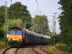 Die Class 66 266 112-2 Beacon-Rail kommt aus Richtung Mönchengladbach-Hbf,Rheydt-Hbf,Wickrath,Beckrath,Herrath mit einem Kalkleerzug aus Oberhausen-West(D) nach Hermalle-Huy(B) und fährt