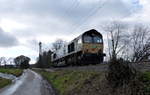 Die Class 66 266 118-9 von Railtraxx  kommt als Lokzug aus Antwerpen(B) die Gemmenicher-Rampe herunter nach Aachen-West.