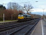 Die Class 66 266 031-4 von Railtraxx kommt mit einem Güterzug aus Zeebrugge-Ramskapelle(B) nach Duisburg-Rheinhausen(D) und kommt aus Richtung Aachen-West,Laurensberg,Richterich und fährt durch Kohlscheid in Richtung Herzogenrath,Hofstadt,Finkenrath,Rimburg,Übach-Palenberg,Zweibrüggen,Frelenberg,Geilenkirchen,Süggerath,Lindern,Brachelen,Hückelhoven-Baal,Baal,Erkelenz,Herrath,Beckrath,Wickrath,Rheydt.
Aufgenommen vom Bahnsteig 2 in Kohlscheid. 
Bei Regenwetter am Abend vom 10.3.2018.