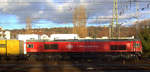 Die Class 66 PB03  Mireille  von Crossrail  fährt mit viel Dieselpower mit einem Güterzug aus Antwerpen-Krommenhoek(B) nach Germersheim(D) und fährt in Richtung Aachen-Schanz,Aachen-Hbf,Aachen-Rothe-Erde,Stolberg-Hbf(Rheinland)Eschweiler-Hbf,Langerwehe,Düren,Merzenich,Buir,Horrem,Kerpen-Köln-Ehrenfeld,Köln-West,Köln-Süd. Aufgenommen vom Bahnsteig von Aachen-West. 
Bei Sonne und Wolken am Nachmittag vom 3.12.2019.