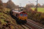 Mu ein relativ lauter Arbeitsplatz sein, so ne Class 66: Der 
Lokfhrer sitzt mit  Mickey-Musern  im  Cockpit, whrend seine DE 670, im  Schiebebetrieb  durch die Kesselwagen, relativ flott die Geislinger Steige hinunterdieselt. (2. November 2008).