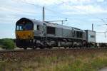 Eine schwarze Schnheit. Class 66 mit Containerzug in Fahrtrichtung Wunstorf. Aufgenommen am 27.08.2009 bei Dedensen/Gmmer.