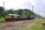 FPL 66003 zieht mit einer staubigen Ladung an der abgestellten BBL 04 (V150.05) vorrber. Eberswalde 19.06.2010