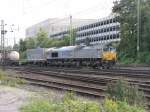 Die Class 66 PB20 von DLC Railways kommt mit einem Containerzug aus Montzen/Belgien und fhrt in Aachen-West ein.