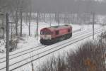 Am 31/12/2010 rollte die rote PB03 von Crossrail solo durch den verschneiten Wald von Moresnet-Chapelle in Richtung Aachen-West.