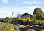 Class 66 PB 14 bei bach-Palenberg / Rimburg mit einem langen Containerzug, aber nur wenige Container am 10.9.11