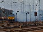 Keine Angst, es brennt nicht, hier zieht nur am 13.02.2011 eine Class66 einen Containerzug aus Aachen West.