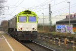  Nochmal Die Class 66 6605 von Captrain durchfhrt als Lokzug aus Herzogenrath kommend den Bahnhof Kohlscheid in Richtung Aachen-West am 6.1.2012.