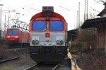 Die Class 66 DE6310  Griet  von Crossrail steht auf dem abstellgleis in Aachen-West an der Laderampe bei Wolken am 15.2.2012.