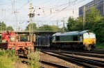 Die Class 66 PB17 von der Rurtalbahn kommt mit einem Autoleerzug aus Belgien znd fhrt in Aachen-West ein in der Abendsonne am 14.6.2012. 
