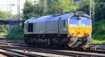 Die Class 66 DE6306 von DLC Railways kommt als Lokzug aus Montzen(B) und fhrt in Aachen-West ei bei Sonnenschein am 22.7.2012.