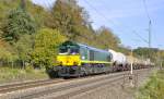 Die Claas 66 DE 678 von Ascendos Rail und von der HGK angemietet ist mit einem Kesselwagenzug auf der Filsbahn unterwegs.Aufgenommen bei Reichenbach an der Fils am 20.10.2012