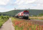 Mit einem Kesselwagenzug drhnte die DE669 der HGK am 10.07.2012 durch's Maintal in Richtung Sden. Aufgenommen bei Harrbach.