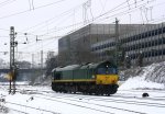Die Class 66 PB20 von Railtraxx BVBA rangiert in Aachen-West  bei starken Schneefall bei etwa 14 Cm Schnee am Aachener-Westbahnhof am 24.2.2013.