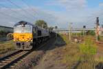 Die 29 005  Ted Gaffney  Class 66 von HHPI eilt am 03.07.2013 in Wolfsburg Hbf  der untergehenden Sonne entgegen.