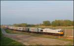 247 020-1 mit Ihren Containerzug auf dem Industriegleis in höhe Schäferei.