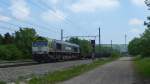 Class66 6601 von Captrain kurz hinter der Blockstelle von Remersdael auf dem Weg von Aachen-West in Richtung Antwerpen.