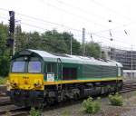 Die Class 66 PB01 von der Rurtalbahn-Cargo kommt als Lokzug aus Montzen(B) und fährt in Aachen-West ein. 
Aufgenommen vom Bahnsteig in Aachen-West bei Sonne und Wolken am 6.8.2014.