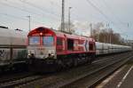 Beim Umrangieren an einem Kohlestaubzug in Rommerskirchen. 
Die RHC DE668/alias 266 068-6 kam aus Niederaussem und fährt den Zug dann nach
Köln, von dort wird er später am Tag von einer Elok gezogen noch einmal an mir vorbei fahren.5.12.2015