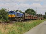 266 027 (29004) von HHPI donnert mit einem Splitzug in Richtung Süden. Aufgenommen bei Eystrup am 22.07.2014.