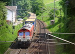 Die Class 66 PB12  Marleen  von Crossrail kommt mit viel Dieselpower die Gemmenicher-Rampe hochgefahren aus Aachen-West mit einem langen LKW-Walter-Zug aus Novara(I) nach Genk-Goederen(B) und fährt gleich in den Gemmenicher-Tunnel hinein und fährt in Richtung Montzen/Vise(B). Aufgenommen in Reinartzkehl an der Montzenroute. 
Bei Sommerwetter am Mittag vom 27.5.2016.