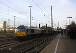 Die Class 66 DE6309 von DLC Railways kommt aus Richtung Montzen/Belgien mit einem Autoleerzug aus Zeebrugge(B) nach Tychy(PL) und fährt in Aachen-West ein.