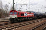 DE668 der HGK mit einem Kesselwagenzug bei der Durchfahrt in Berlin-Schönefeld Flughafen am 28.02.2017