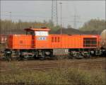 RBH 823 (MaK G1206 der RBH Logistics) hat den Gbf. Gelsenkirche-Bismarck in Richtung Oberhausen/Duisburg durchfahren. 10.04.2008