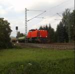 Eine MaK G1206 ist am 10.9.10 mit einem Bauzug Richtung Lichtenfels, in Halach(b. Kronach).