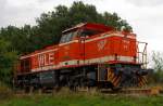 Die WLE 51  Kreis Warendorf  (Westflische Landes-Eisenbahn) eine MaK G 1206 steht am 17.09.2013 am einem Werksanschlu in Burbach-Holzhausen.