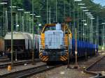 277 031-1 von Schweerbau steht am 06.08.2012 mit einem Niederbordwagenzug mit Rungen in Aachen West.